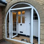 French doors with arched side frames in white PVC supplied and fitted in Formby, Liverpool