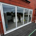 We recently completed a project in Southport, supplying and fitting a set of white aluminium bi-fold doors (four panels) to create a seamless connection between the home and garden.