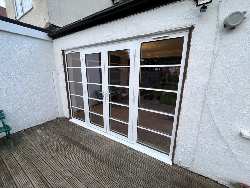We recently completed a feature installation at a property in Ainsdale, Southport, Liverpool, Manchester, Blackburn, Lancaster, Ormskirk, Preston - fitting a set of white Crittall-style French doors with matching sidelights to create a striking and elegant rear elevation.