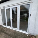 We recently completed a feature installation at a property in Ainsdale, Southport, Liverpool, Manchester, Blackburn, Lancaster, Ormskirk, Preston - fitting a set of white Crittall-style French doors with matching sidelights to create a striking and elegant rear elevation.