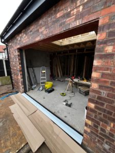 We recently completed the installation of a two-panel black aluminium sliding door at a new build property in Chester, creating a sleek and contemporary connection between the interior living space and the garden. We supply and fit aluminium patio doors in Southport, Ormskirk, Liverpool, Chester, Manchester, Bolton, Blackburn, Preston, Lancaster and all surrounding areas in the Northwest.