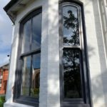 PVC sliding sash windows with Georgian bars