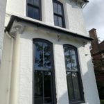 PVC sliding sash windows with Georgian bars