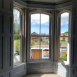 PVC sliding sash windows with Georgian bars