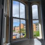 PVC sliding sash windows with Georgian bars
