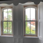 PVC sliding sash windows with Georgian bars