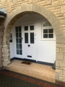French doors with arched side frames in white PVC supplied and fitted in Formby, Liverpool