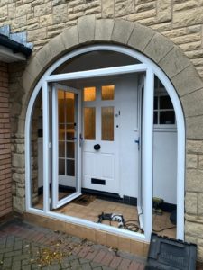 French doors with arched side frames in white PVC supplied and fitted in Formby, Liverpool