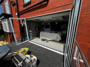 We recently completed a project in Southport, supplying and fitting a set of white aluminium bi-fold doors (four panels) to create a seamless connection between the home and garden.