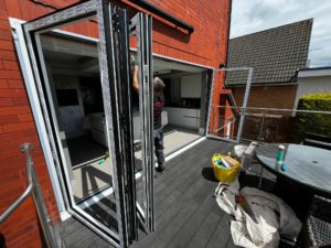 We recently completed a project in Southport, supplying and fitting a set of white aluminium bi-fold doors (four panels) to create a seamless connection between the home and garden.