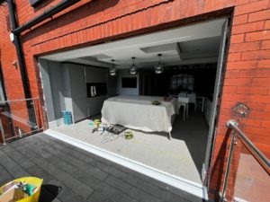 We recently completed a project in Southport, supplying and fitting a set of white aluminium bi-fold doors (four panels) to create a seamless connection between the home and garden.