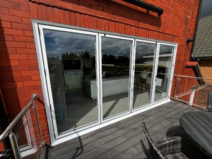 We recently completed a project in Southport, supplying and fitting a set of white aluminium bi-fold doors (four panels) to create a seamless connection between the home and garden.