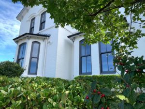 PVC sliding sash windows with Georgian bars