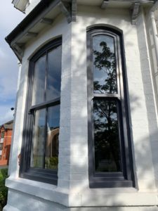 PVC sliding sash windows with Georgian bars