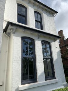PVC sliding sash windows with Georgian bars