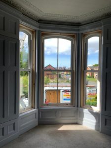 PVC sliding sash windows with Georgian bars