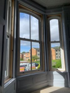 PVC sliding sash windows with Georgian bars
